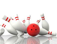 Bowling ball striking pins